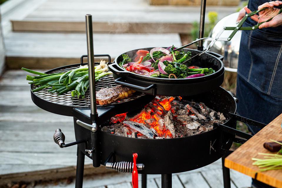 Inspired by South African braais, the Kudu grill uses a modular system of cooking surfaces that can be raised, lowered, and rotated. KUDU GRILLS .jpeg