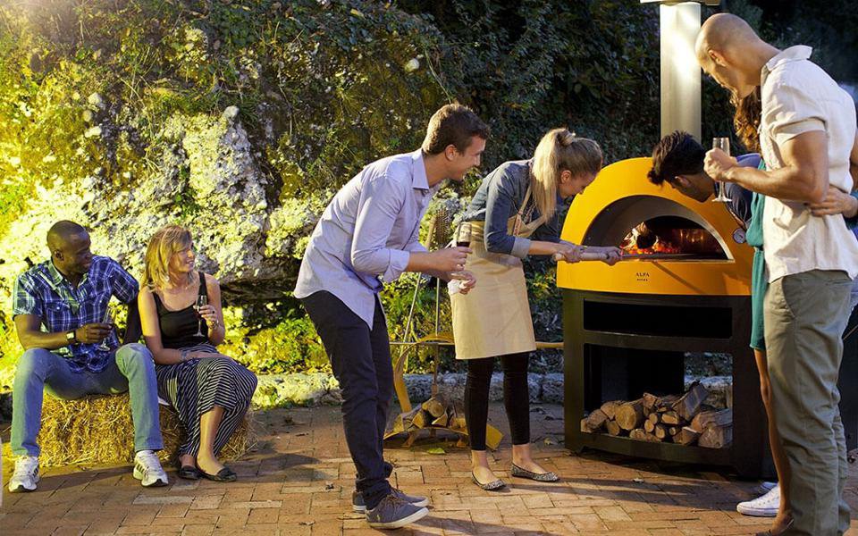 The Allegro pizza oven brings traditional Italian wood fired cooking to Dad's backyard. BBQGUYS.COM .jpeg