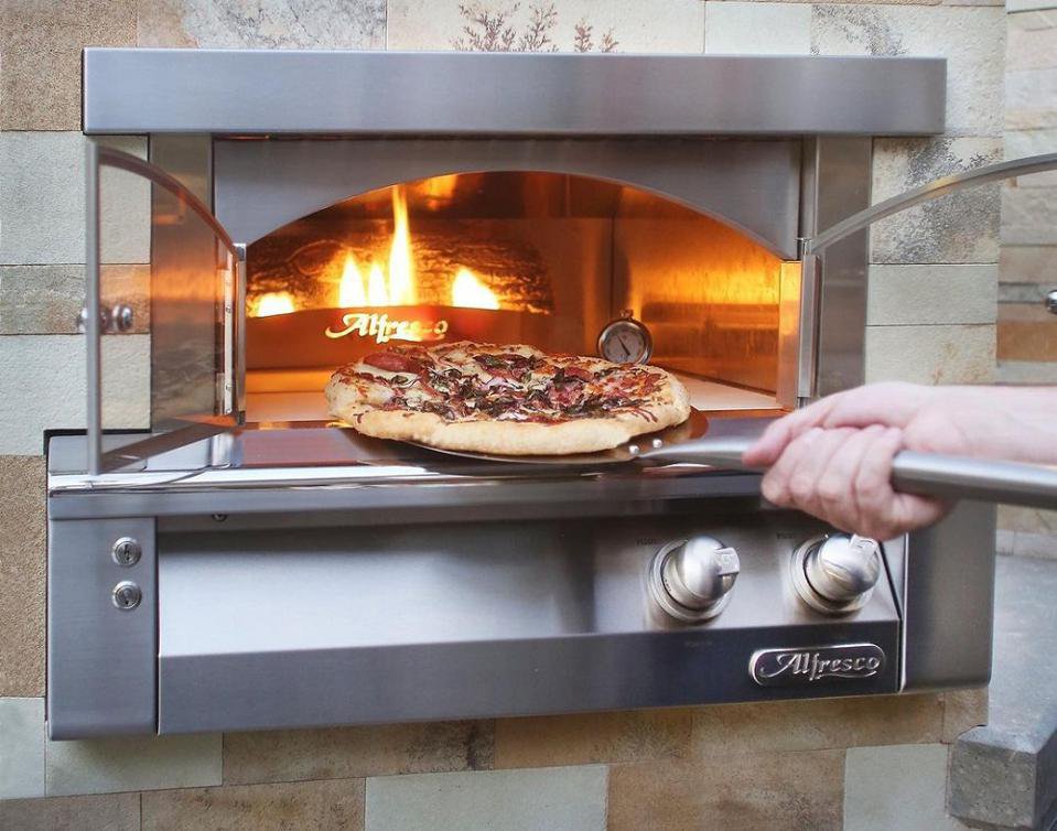 The gas fired Alfresco pizza oven combines convenience with America's favorite food BBQGUYS.COM .jpeg
